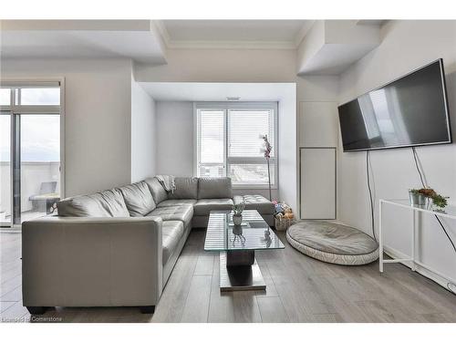 609-1105 Leger Way Way, Milton, ON - Indoor Photo Showing Living Room