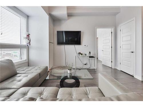 609-1105 Leger Way Way, Milton, ON - Indoor Photo Showing Living Room