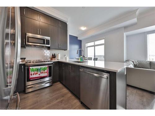 609-1105 Leger Way Way, Milton, ON - Indoor Photo Showing Kitchen With Stainless Steel Kitchen With Upgraded Kitchen