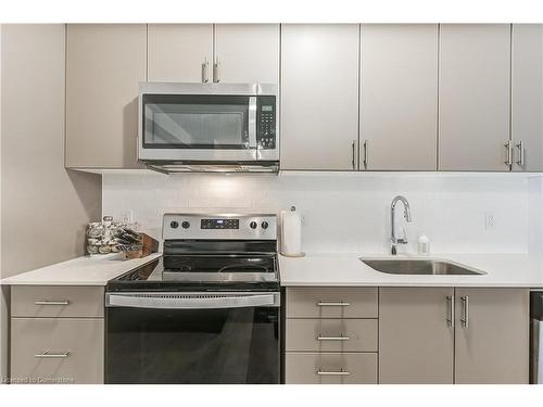 401-3200 William Coltson Avenue, Oakville, ON - Indoor Photo Showing Kitchen With Upgraded Kitchen