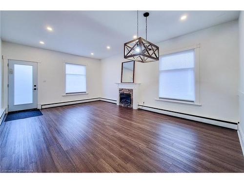 42 Strathcona Avenue, Brantford, ON - Indoor Photo Showing Other Room With Fireplace