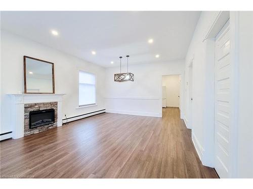 42 Strathcona Avenue, Brantford, ON - Indoor Photo Showing Living Room With Fireplace