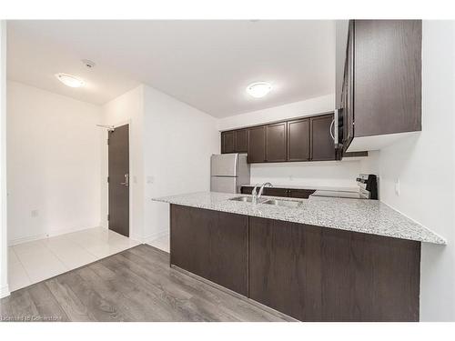 204-2375 Bronte Road, Oakville, ON - Indoor Photo Showing Kitchen With Double Sink