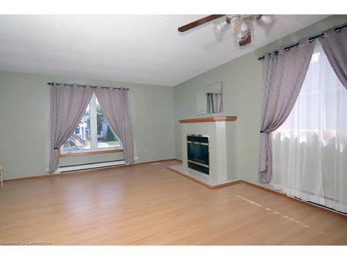 13 Cumming Street, St. Catharines, ON - Indoor Photo Showing Living Room With Fireplace