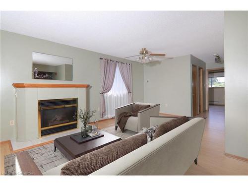 13 Cumming Street, St. Catharines, ON - Indoor Photo Showing Living Room With Fireplace