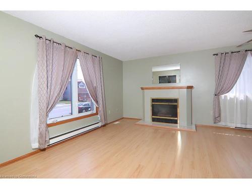 13 Cumming Street, St. Catharines, ON - Indoor Photo Showing Living Room With Fireplace