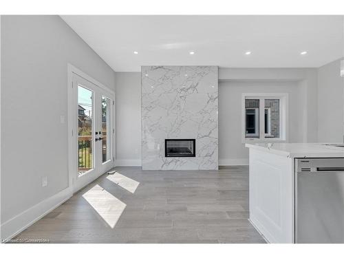 86 Beland Avenue N, Hamilton, ON - Indoor Photo Showing Living Room With Fireplace