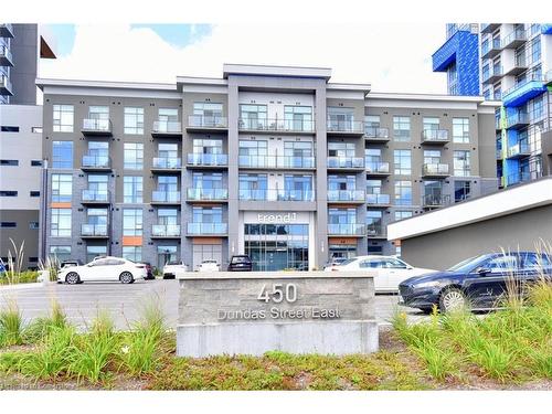 707-450 Dundas Street E, Waterdown, ON - Outdoor With Balcony With Facade