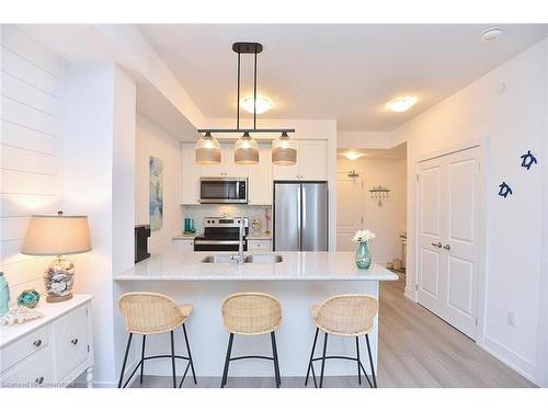 707-450 Dundas Street E, Waterdown, ON - Indoor Photo Showing Kitchen With Stainless Steel Kitchen With Upgraded Kitchen