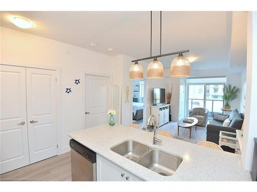 707-450 Dundas Street E, Waterdown, ON - Indoor Photo Showing Kitchen With Double Sink