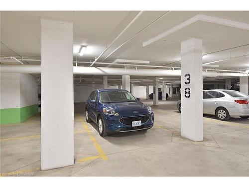 707-450 Dundas Street E, Waterdown, ON - Indoor Photo Showing Garage