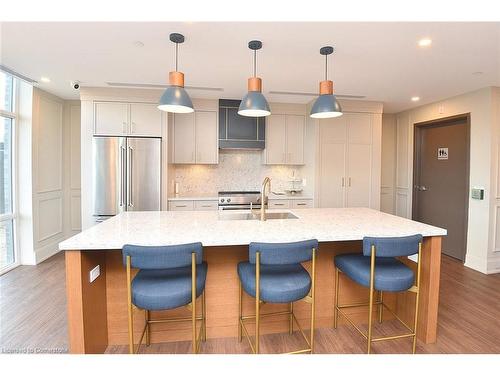 707-450 Dundas Street E, Waterdown, ON - Indoor Photo Showing Kitchen With Stainless Steel Kitchen With Upgraded Kitchen