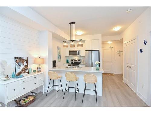 707-450 Dundas Street E, Waterdown, ON - Indoor Photo Showing Kitchen With Stainless Steel Kitchen