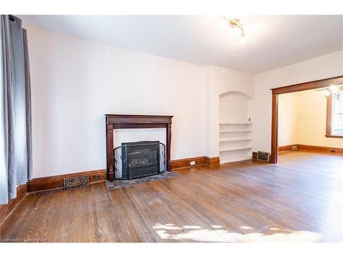 26 Ontario Avenue, Hamilton, ON - Indoor Photo Showing Living Room With Fireplace