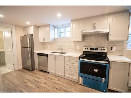 2-130 West 34Th Street, Hamilton, ON - Indoor Photo Showing Kitchen With Stainless Steel Kitchen With Double Sink