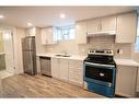 2-130 West 34Th Street, Hamilton, ON  - Indoor Photo Showing Kitchen With Stainless Steel Kitchen With Double Sink 