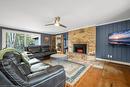 7662 Birch Drive, Washago, ON  - Indoor Photo Showing Living Room With Fireplace 