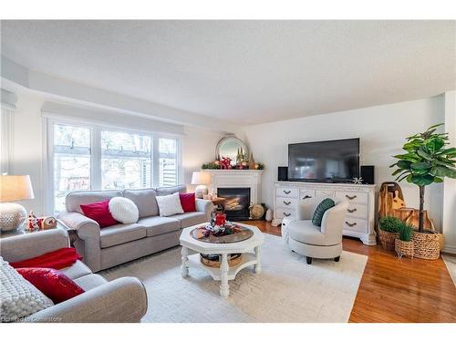 19-375 Book Road, Grimsby, ON - Indoor Photo Showing Living Room With Fireplace