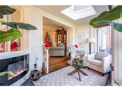 19-375 Book Road, Grimsby, ON - Indoor Photo Showing Living Room With Fireplace