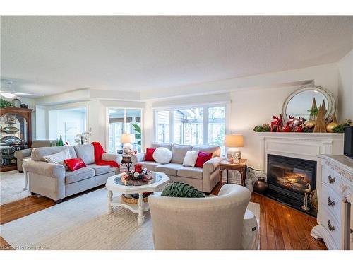 19-375 Book Road, Grimsby, ON - Indoor Photo Showing Living Room With Fireplace