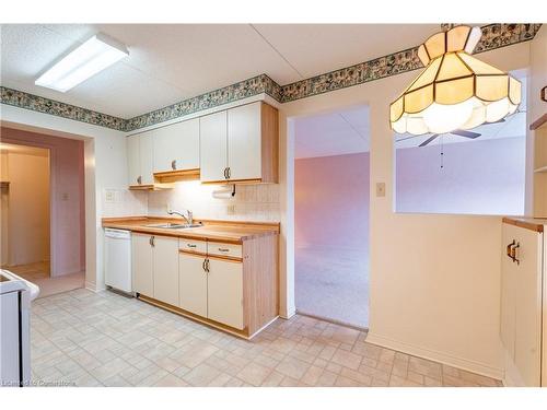 604-11 Mill Pond Court, Simcoe, ON - Indoor Photo Showing Kitchen With Double Sink