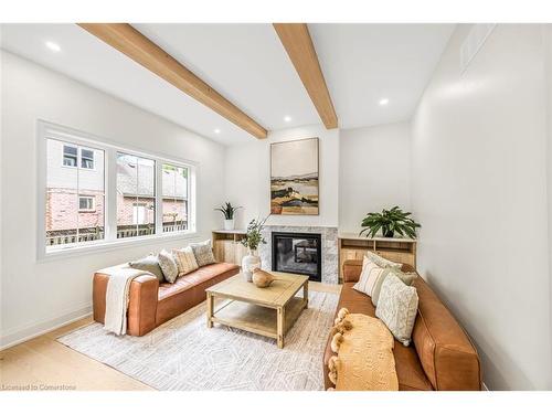 63 Brian Boulevard, Waterdown, ON - Indoor Photo Showing Living Room With Fireplace