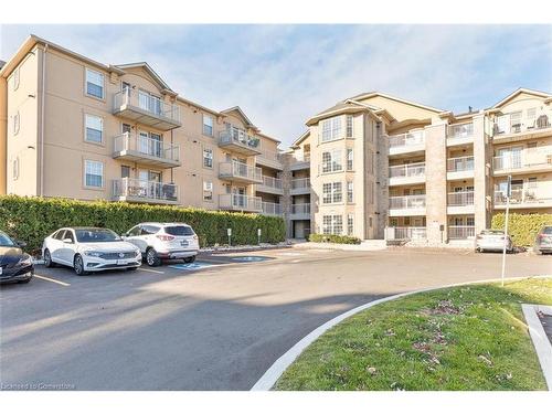 314-1490 Bishops Gate, Oakville, ON - Outdoor With Balcony With Facade