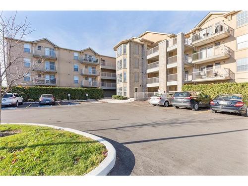 314-1490 Bishops Gate, Oakville, ON - Outdoor With Balcony With Facade