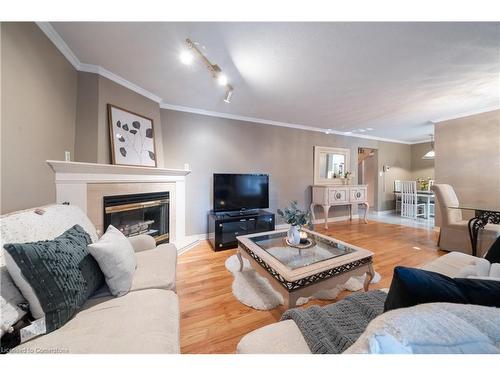 6-230 Meadowbrook Drive, Ancaster, ON - Indoor Photo Showing Living Room With Fireplace