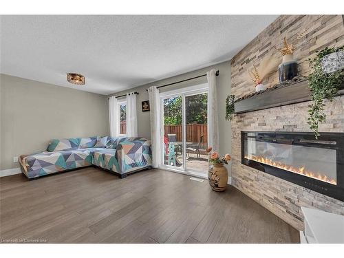 42-2200 Glenwood School Drive, Burlington, ON - Indoor Photo Showing Bedroom With Fireplace