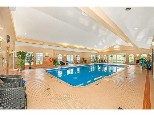 52 Postoaks Drive, Glanbrook, ON - Indoor Photo Showing Other Room With In Ground Pool