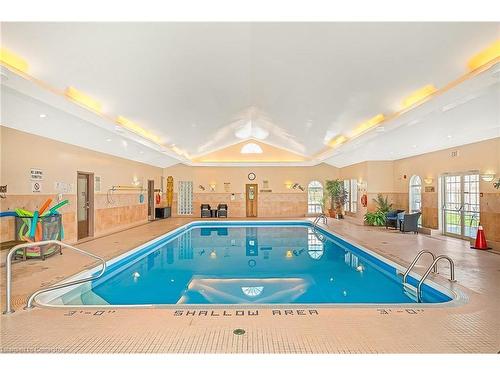 52 Postoaks Drive, Glanbrook, ON - Indoor Photo Showing Other Room With In Ground Pool