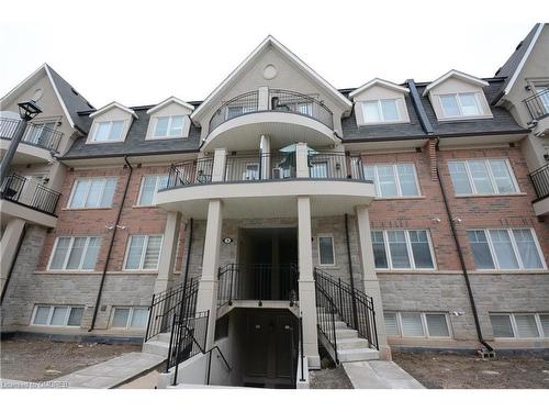 03-03-2420 Baronwood Drive, Oakville, ON - Outdoor With Facade