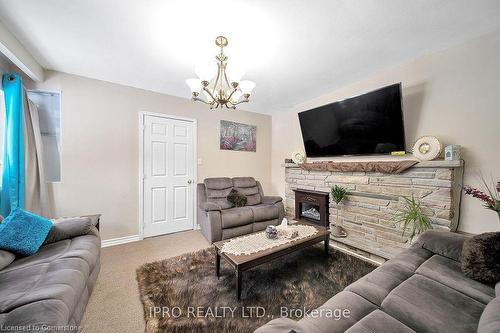 272 Westcourt Place, Waterloo, ON - Indoor Photo Showing Living Room With Fireplace