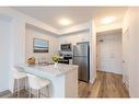 417-5055 Greenlane Road, Beamsville, ON  - Indoor Photo Showing Kitchen With Stainless Steel Kitchen 