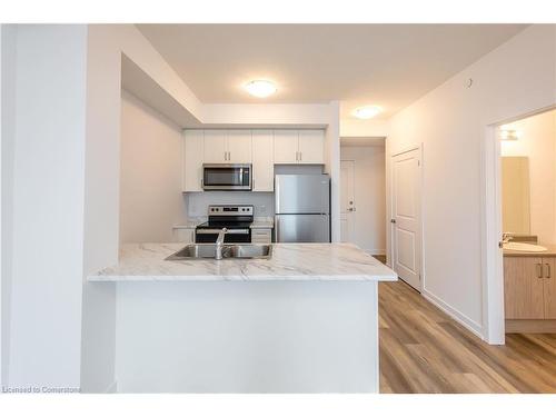 417-5055 Greenlane Road, Beamsville, ON - Indoor Photo Showing Kitchen With Stainless Steel Kitchen With Double Sink