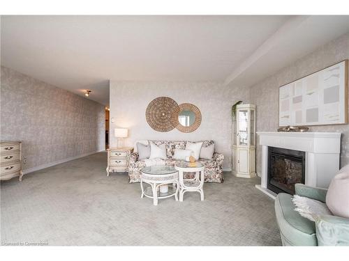 911-5280 Lakeshore Road, Burlington, ON - Indoor Photo Showing Other Room With Fireplace