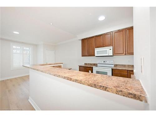 213-443 Centennial Forest Drive, Milton, ON - Indoor Photo Showing Kitchen