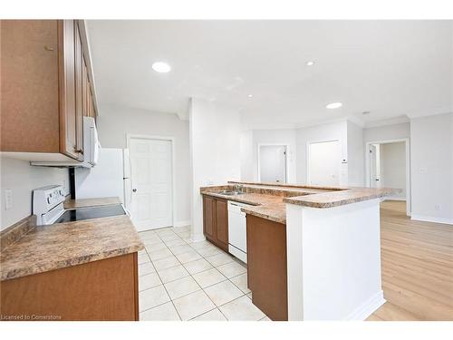 213-443 Centennial Forest Drive, Milton, ON - Indoor Photo Showing Kitchen