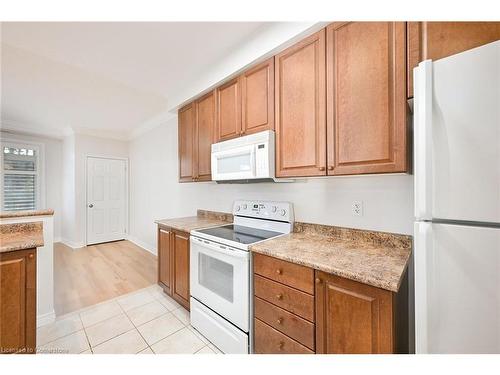 213-443 Centennial Forest Drive, Milton, ON - Indoor Photo Showing Kitchen