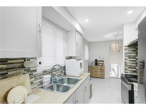 82 Guildwood Drive, Hamilton, ON - Indoor Photo Showing Kitchen With Double Sink