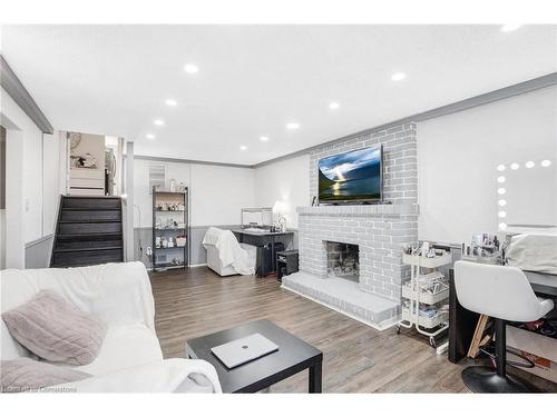 82 Guildwood Drive, Hamilton, ON - Indoor Photo Showing Living Room With Fireplace