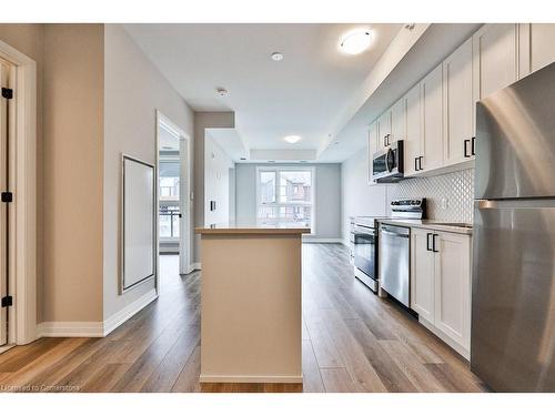 201-480 Gordon Krantz Avenue, Milton, ON - Indoor Photo Showing Kitchen With Upgraded Kitchen