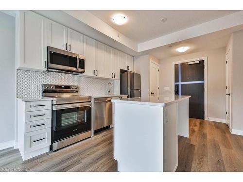 201-480 Gordon Krantz Avenue, Milton, ON - Indoor Photo Showing Kitchen With Upgraded Kitchen