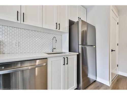 201-480 Gordon Krantz Avenue, Milton, ON - Indoor Photo Showing Kitchen With Upgraded Kitchen