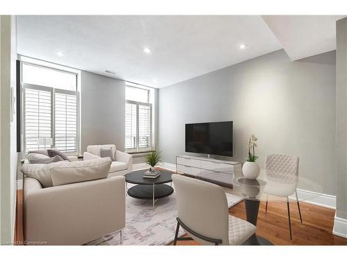 206-283 King Street E, Hamilton, ON - Indoor Photo Showing Living Room