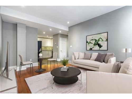 206-283 King Street E, Hamilton, ON - Indoor Photo Showing Living Room