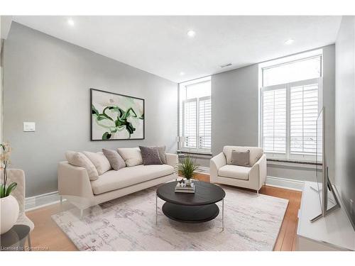 206-283 King Street E, Hamilton, ON - Indoor Photo Showing Living Room