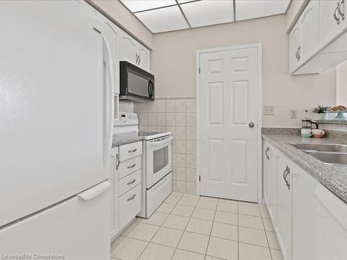 703-495 8 Highway, Stoney Creek, ON - Indoor Photo Showing Kitchen With Double Sink