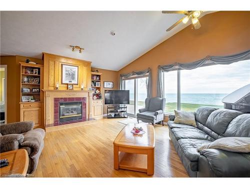 2948 North Shore Drive, Lowbanks, ON - Indoor Photo Showing Living Room With Fireplace